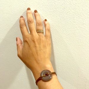 Brown chalcedony and silk pi disc bracelet. NWOT